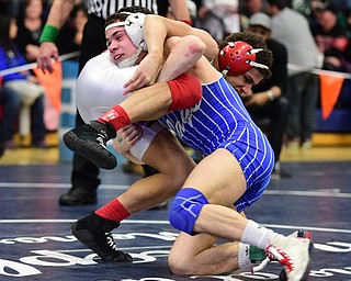 AUSTINTOWN, OHIO - JANUARY 24, 2015:Mitch Tikkanen of Jackson Milton attempts to complete a takedown attempt of Andre Lowey of Shaw during their 113lb championship bout Saturday evening at Fitch High School. (Photo by David Dermer/Youngstown Vindicator)