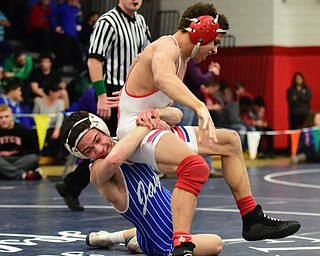 AUSTINTOWN, OHIO - JANUARY 24, 2015:Mitch Tikkanen of Jackson Milton attempts to complete a takedown attempt of Andre Lowey of Shaw during their 113lb championship bout Saturday evening at Fitch High School. (Photo by David Dermer/Youngstown Vindicator)
