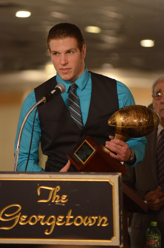 Katie Rickman | The Vindicator.Mark Schuler speaks after receiving the Byrd Giampetro Scholarship at the Curbstone Coaches Banquet on Jan. 25, 2015.