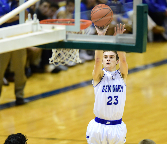 YOUNGSTOWN, OHIO - JANUARY 25, 2014: Jared Burkert #23 of Poland shoots a wide open three point shot during the first half of Sunday evenings game at Covelli Centre. (Photo by David Dermer/Youngstown Vindicator)