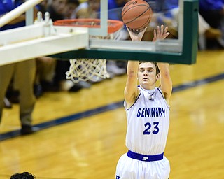 YOUNGSTOWN, OHIO - JANUARY 25, 2014: Jared Burkert #23 of Poland shoots a wide open three point shot during the first half of Sunday evenings game at Covelli Centre. (Photo by David Dermer/Youngstown Vindicator)