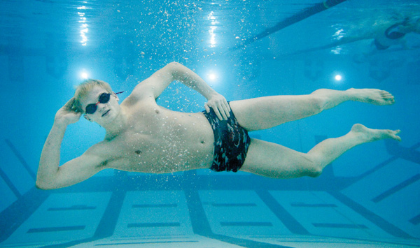 Canfield High School senior Connor Brady poses for a photo in the Youngstown State University pool.