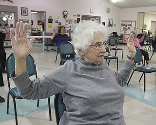 William D. Lewis the vindicator Patty DeMas of Girard.participates in a chair excerise program at the Niles Senior Center 1-16-15.