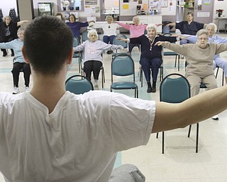 William D. Lewis the vindicatorBrian Jones, a Senior Excerise Instructor teaches a chair excerise program at the Niles Senior Center 1-16-15.