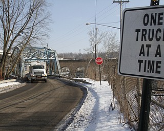        ROBERT K. YOSAY  | THE VINDICATOR..The old Division Street Bridge .. connecting Salt Springs Rd and Ohio Works Blvd and  US 422 is scheduled for demolition and replacement by the Mahoning County Commisioners.