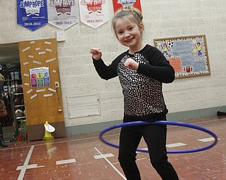       ROBERT K. YOSAY  | THE VINDICATOR..doing the Hula is Ally Guerriero.. (kindergarten) .PE classes at Stadium Drive  Elementary in Boardman School are participating in a jump-roping /hula-hoope  event to raise money for the American Heart Association.
