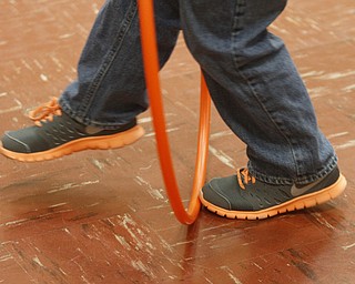        ROBERT K. YOSAY  | THE VINDICATOR..jumping is sometimes done one step at a time with a hula hoop..PE classes at Stadium Drive  Elementary in Boardman School are participating in a jump-roping /hula-hoope  event to raise money for the American Heart Association.