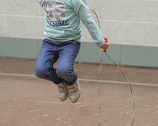        ROBERT K. YOSAY  | THE VINDICATOR..Taylor Logan --  jumps for the heart association - she is a kindergarten student..PE classes at Stadium Drive  Elementary in Boardman School are participating in a jump-roping /hula-hoope  event to raise money for the American Heart Association.