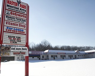        ROBERT K. YOSAY  | THE VINDICATOR..Moon Park, owner of the martial arts company Master Park , has lost one of his three properties. A property that has been vacant for more than a decade, and an eyesore to Austintown residents, was bought in a sheriffÕs sale by Talmer Bank last week. ParkÕs two other properties were recalled from the sale because he filed bankruptcy...CHECK ONE.