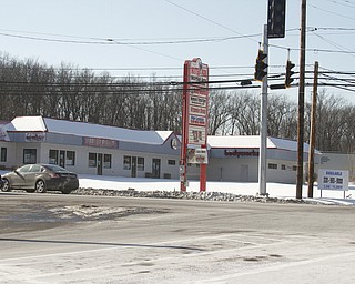        ROBERT K. YOSAY  | THE VINDICATOR..Moon Park, owner of the martial arts company Master Park , has lost one of his three properties. A property that has been vacant for more than a decade, and an eyesore to Austintown residents, was bought in a sheriffÕs sale by Talmer Bank last week. ParkÕs two other properties were recalled from the sale because he filed bankruptcy...CHECK ONE.