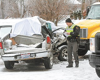 Rain, falling temperatures and snow contributed to several traffic accidents Thursday, including one that killed
a husband and wife on Mahoning Avenue near Turner Road in Austintown. Irven B. Wilhelm, 78, and his wife,
Evelyn, 76, of Deerfield, died at the scene.