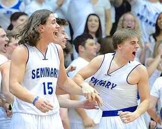Jeff Lange | The Vindicator  Poland's Nick Buccieri (left) and Nick Romeo (right) celebrate as the Bulldogs put up another two points in the fourth quarter of Friday night's matchup against Canfield at home.