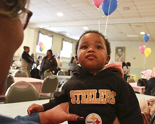 William D. Lewis The Vindicator Joe'Aiyshia Oliver, 1,  takes in the sights t the city baby shower Monday at the McGuffey Center. She is a daughter of Jazmynn Shade of Youngstown.