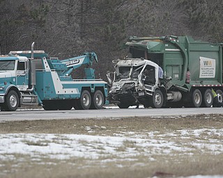        ROBERT K. YOSAY  | THE VINDICATOR...a two truck pile up with a Waste Management truck rear ended a semi traveling in the same direction brought traffic to a crawl in the west bound lanes of 76 just west of the turnpike interchange.  Unknown injuries.