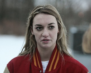        ROBERT K. YOSAY  | THE VINDICATOR...Cardinal Mooney High SchoolÕs colors are red and gold, but about 100 students donned white T-shirts Tuesday morning to show support for their ousted principal..John Young, principal since 2011, was terminated last week and the Catholic Diocese of Youngstown hasnÕt revealed the reason, calling it a personnel matter.