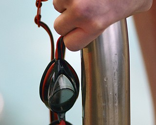 Katie Rickman | The Vindicator.Connor Brady a senior at Canfield High School held his goggles while being interviewed at the pool at YSU on Wednesday, Jan. 21, 2015.