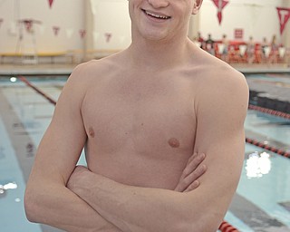 Katie Rickman | The Vindicator.Connor Brady a senior at Canfield High School poses for a photo at the pool at YSU on Wednesday, Jan. 21, 2015.