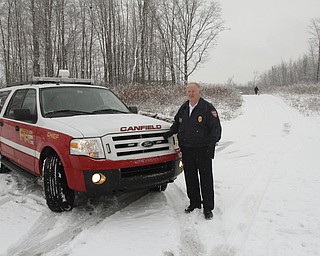        ROBERT K. YOSAY  | THE VINDICATOR..Timber Run Drive where it dead-ends into the emergency route off of Herbert Road and connecting /Gibson Road, off of state Route 46.The road was never finished by the city or the twp developers - do to turnpike construction this summer the road will finally connect .. Timber Run Drive and where that ends we meet with Fire Chief Don Hutchison...