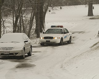        ROBERT K. YOSAY  | THE VINDICATOR...a car that was owned by a man who was found with head injuries in his home .. the car was found in nearby Calvary Cemetery on Mahoning Ave..
