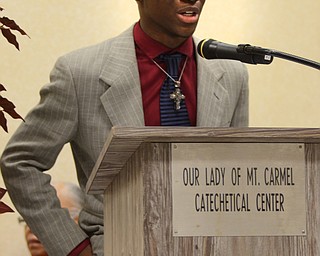 Katie Rickman | The Vindicator.Students of the CPA Dancers from Chaney High School dance to “Grandma’s Hands” before Dr. Connie Hathorn spoke at the 2015 State of the District Address at Our Lady of Mount Carmel Church on Thursday, Jan. 22, 2015.