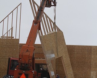  .          ROBERT  K. YOSAY | THE VINDICATOR..The Canfield Library is taking shape  as The new $5 million library is being built . on the same site as the previous library, which was demolished this fall...The construction schedule calls for the new building should be done in late 2015, ..-30-