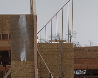  .          ROBERT  K. YOSAY | THE VINDICATOR..The Canfield Library is taking shape  as The new $5 million library is being built . on the same site as the previous library, which was demolished this fall...The construction schedule calls for the new building should be done in late 2015, ..-30-