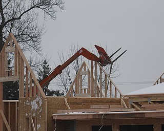  .          ROBERT  K. YOSAY | THE VINDICATOR..The Canfield Library is taking shape  as The new $5 million library is being built . on the same site as the previous library, which was demolished this fall...The construction schedule calls for the new building should be done in late 2015, ..-30-