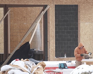  .          ROBERT  K. YOSAY | THE VINDICATOR..The Canfield Library is taking shape  as The new $5 million library is being built . on the same site as the previous library, which was demolished this fall...The construction schedule calls for the new building should be done in late 2015, ..-30-