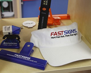  .          ROBERT  K. YOSAY | THE VINDICATOR..Some of the products available at  Jay and Penny Summer --FASTSIGNS¨ a sign, graphics and visual communications company that provides comprehensive visual marketing solutions to customers of all sizesÑacross all industriesÑto help them meet their business objectives and increase their business visibility....-30-