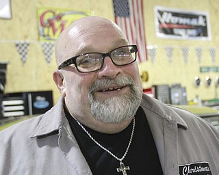 William d Lewis The Vindicator  Fat and Furious cast member Tommy Christmas in his garage.
