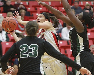 William D. Lewis the vindicator  YS's Heidi Schlegel(15) shoots  past Wright State's Tayler Stanton(21) and Courtney Boyd (23) during 1-22-15 action.
