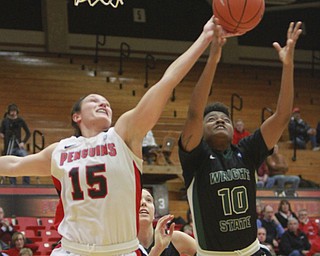 William D. Lewis the vindicator  YS's Heidi Schlegel(15) shoots  past Wright State's JJ Williams (10) and Courtney Boyd (23) during 1-22-15 action