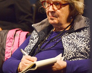 Katie Rickman | The Vindicator.Georgia Berner, President of Berner International Corp. takes notes during the second session of TEDx at Ford Theatre in Bliss Hall at Youngstown State University on Friday, January 23, 2015.