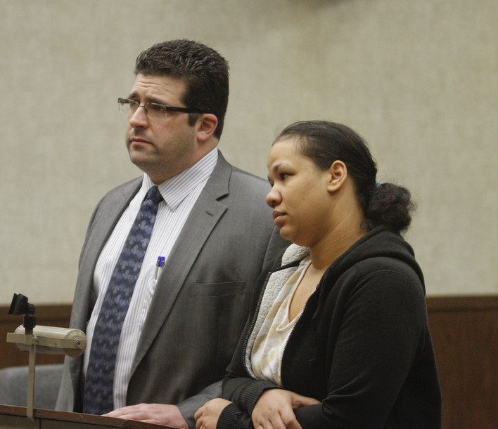        ROBERT K. YOSAY  | THE VINDICATOR..Tameka Smith with her attorney James Lanzo ... pleads not guilty and was  bonded out at 1500 dollars (10%) and will face the court again June 26th .. Jason Cooke organized a rally for the dog who was left to starve to death in Campbell, to take place at the Campbell Municipal Courthouse. Cooke did not know the dogs name or if it was a boy or girl, so he called it Charlie. The rally is called ÒJustice For CharlieÓ and it is meant to bring attention not only to this case, but to all cases of animal abuse and neglect. .-30-