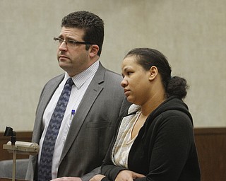        ROBERT K. YOSAY  | THE VINDICATOR..Tameka Smith with her attorney James Lanzo ... pleads not guilty and was  bonded out at 1500 dollars (10%) and will face the court again June 26th .. Jason Cooke organized a rally for the dog who was left to starve to death in Campbell, to take place at the Campbell Municipal Courthouse. Cooke did not know the dogs name or if it was a boy or girl, so he called it Charlie. The rally is called ÒJustice For CharlieÓ and it is meant to bring attention not only to this case, but to all cases of animal abuse and neglect. .-30-