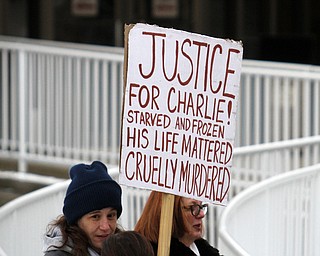        ROBERT K. YOSAY  | THE VINDICATOR.. Jason Cooke organized a rally for the dog who was left to starve to death in Campbell, to take place at the Campbell Municipal Courthouse. Cooke did not know the dogs name or if it was a boy or girl, so he called it Charlie. The rally is called ÒJustice For CharlieÓ and it is meant to bring attention not only to this case, but to all cases of animal abuse and neglect. .-30-