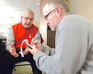 Jeff Lange | The Vindicator  Youngstown State University President Jim Tressel tells Vindy Sports editor Ed Puskas about his experience at AT&T Stadium during the College Football National Championship, Saturday morning at the Maronite Center during the YSU baseball breakfast.