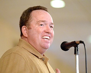 Jeff Lange | The Vindicator  YSU baseball coach Steve Gillispie laughs as he describes the things he shares in common with Johnny Bench during his speech at the YSU baseball breakfast held at the Maronite Center, Saturday morning.