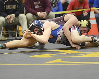 Katie Rickman | The Vindicator.Fitch's Andrew Fairbanks wrestles Mitch Skleres (school-PYMV?) during the EOWL Championship match at Crestview High School Saturday, Feb. 7, 2015. Fairbanks won the match.
