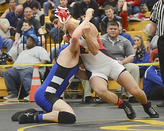 Katie Rickman | The Vindicator.Canfield's Georgio Poullas wrestles Cody Rhoads (school- GRVA) during the EOWL Championship match at Crestview High School Saturday, Feb. 7, 2015. Poullas won the match.