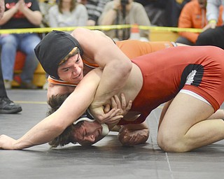 Katie Rickman | The Vindicator.Howland's Jordan Radich  wrestles Salem's Jesse Slocum  during the EOWL Championship match at Crestview High School Saturday, Feb. 7, 2015. Poullas won the match. Radich won the match.