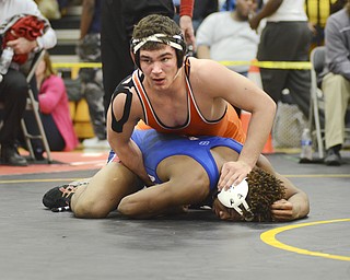 Katie Rickman | The Vindicator.Howland's David-Brian Wisler wrestles Fitch's Isiah Jackson during the EOWL Championship match at Crestview High School Saturday, Feb. 7, 2015. Poullas won the match. Wisler won the match becoming a four-time champion.