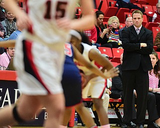 YOUNGSTOWN, OHIO - FEBRUARY 7, 2015: Head coach John Barnes watches from the sideline during the 1st half of Saturday afternoons game at Beeghly Center. (photo by David Dermer/Youngstown Vindicator)
