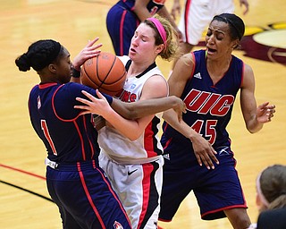 YOUNGSTOWN, OHIO - FEBRUARY 7, 2015: Nikki Arbanas #4 of YSU battles for the loose ball while tangled up with Melita Emanuel-Carr #1 and Gisselle Tuiett #45 of UIC during the 2nd half of Saturday afternoons game at Beeghly Center. (photo by David Dermer/Youngstown Vindicator)