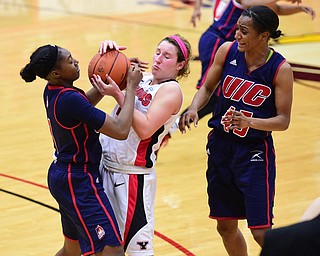 YOUNGSTOWN, OHIO - FEBRUARY 7, 2015: Nikki Arbanas #4 of YSU battles for the loose ball while tangled up with Melita Emanuel-Carr #1 and Gisselle Tuiett #45 of UIC during the 2nd half of Saturday afternoons game at Beeghly Center. (photo by David Dermer/Youngstown Vindicator)