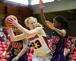 YOUNGSTOWN, OHIO - FEBRUARY 7, 2015: Sarch Cash #23 of YSU looks to pass the ball after having her lane to the basket cut off by Imani Moore #22 and Kendyl Nunn #25 of UIC during the 2nd half of Saturday afternoons game at Beeghly Center. (photo by David Dermer/Youngstown Vindicator)
