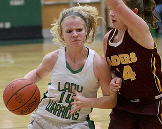 William D Lewis The Vindicator west Branch's Melinda Trimmer(14) drives around SR's Jordan Youngs(14).