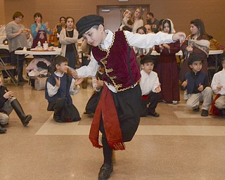 Katie Rickman | The Vindicator. John Frangos 8 of Hubbard dances a traditional Greek dance along with other children during the first night of the Greek Festival at Archangel Michael Greek Orthodox Church in Campbell on Friday, Feb. 13, 2015.