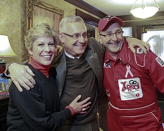 William D. Lewis The Vindicator Youngstown State University President Jim Tressel, his wife Ellen  and Teddy McHuggin of Youngstown, Guinness world hugging record holder, will participate in the kick-off of the American Heart AssociationÕs local Hugs for Heart Challenge which begins at 5 p.m. Monday at the Pollock House on Wick Avenue..The purpose of the event is to raise awareness about the importance of fighting heart disease and funds, according to the American Heart Association (AHA)..McHuggin, also known as Jeff Ondash, said he aims to raise $50,000 and give out 50,000 hugs by March 16. Individuals may donate by visiting his web site at www.teddymchuggin.com where they may click ÒDonate Now,Ó and be connected to a donation page for the American Heart Association..