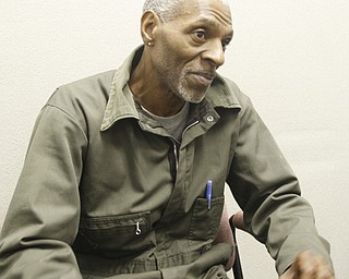        ROBERT K. YOSAY  | THE VINDICATOR..Roosevelt Harmon ..at the Methodist Community Center in downtown YTown.. Continuum of CareÕs annual  homeless count. a vet reads the form for counting the homeless